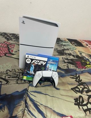 Consola PS5 con mando y juegos