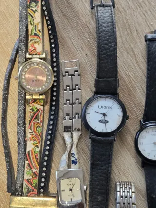 Lote 15 relojes y piezas