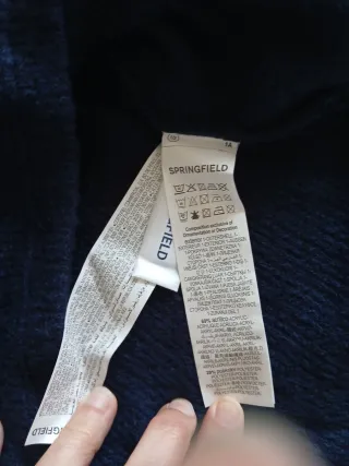 Jersey azul con camisa de cuadros