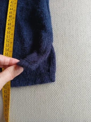 Jersey azul con camisa de cuadros