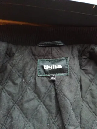 Chaqueta de cuero bomber negra y verde