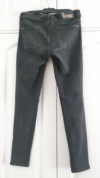 Pantalones Zara grises rotos