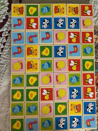 Dominó de madera con animales