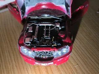 Coches a escalas 1/18