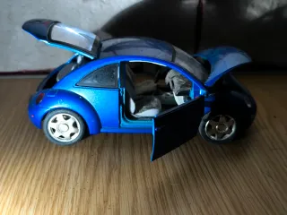 Coches a escalas 1/18