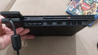 PS2 Slim Nera + 2 Controller + Gioco