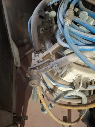 Máquina de gotelé con mangueras