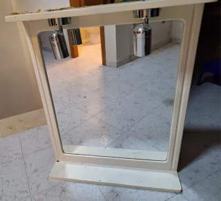 Mueble con lavabo, espejo con luz, armario y leja