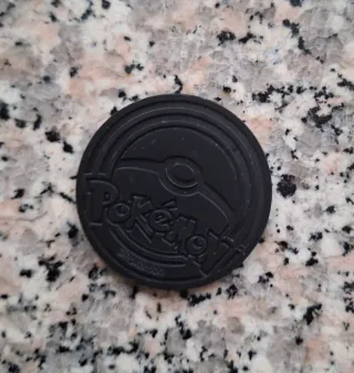 Bustine, moneta e divisori Pokemon