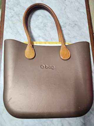 O bag bolso marrón/dorado