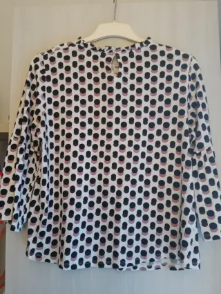 Blusa de topos rosa y blanco