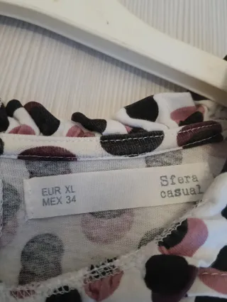 Blusa de topos rosa y blanco