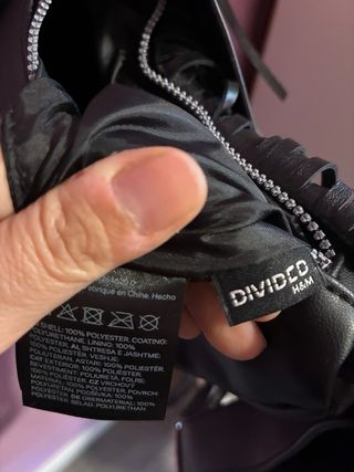 Bolso negro con flecos