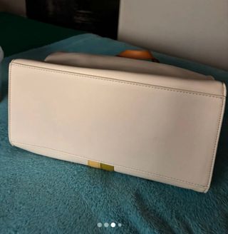 Bolso blanco y marrón con rayas