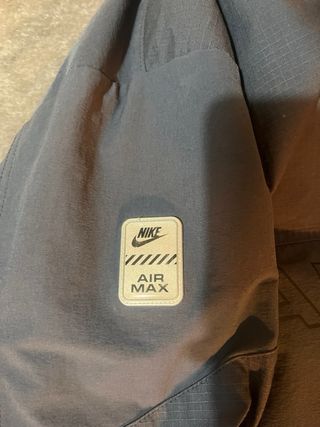 Chubasquero Nike Gris