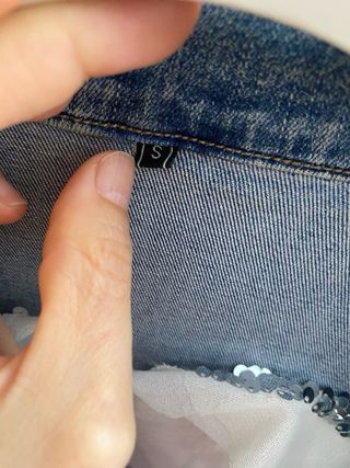 Cazadora tejana con alas plateadas