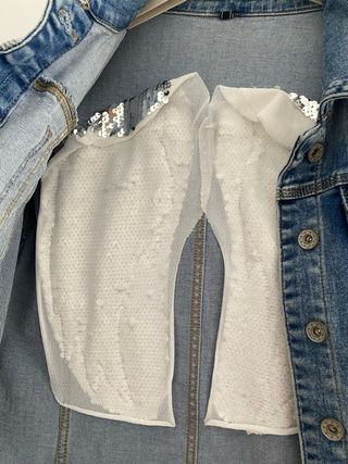 Cazadora tejana con alas plateadas