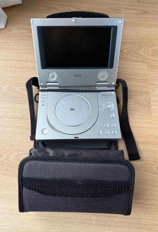 Reproductor DVD Portátil Airis y 6 películas Dvds