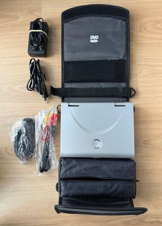 Reproductor DVD Portátil Airis y 6 películas Dvds