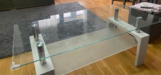 Mesa de centro cristal y acero.