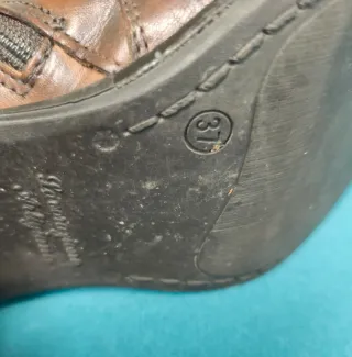 Botas de cuero marrones con hebillas