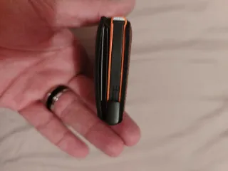 Cartera Secrid Marrón, con naranja