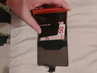 Cartera Secrid Marrón, con naranja