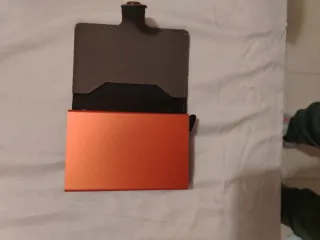 Cartera Secrid Marrón, con naranja
