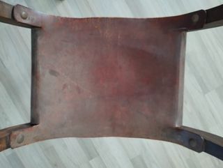 Sillón de madera tallada estilo romano