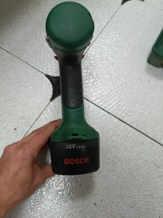 Taladro Bosch PSR 12 VE-2 y estuche de brocas
