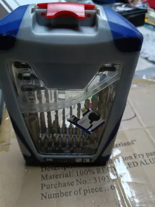 Taladro Bosch PSR 12 VE-2 y estuche de brocas