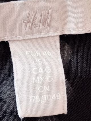 top H&M negro topos blancos