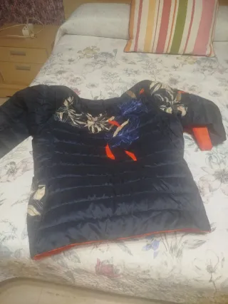 Plumas floral azul y naranja