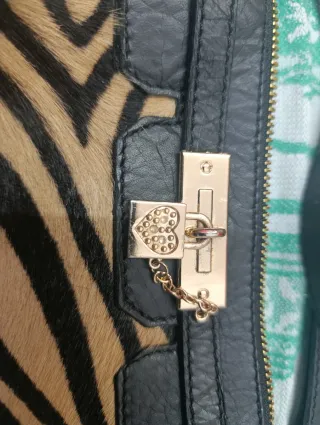 Bolso estampado cebra y negro