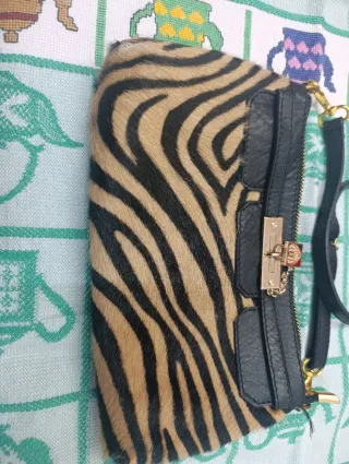 Bolso estampado cebra y negro