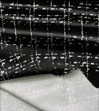 Vestido jaspeado negro y blanco