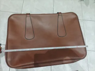 Maleta de viaje de cuero marrón