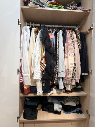 Guardaroba laccato bianco lucido ad angolo