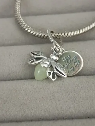 Charm luciérnaga nuevo