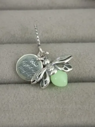 Charm luciérnaga nuevo
