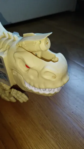 Camión de dinosaurios de juguete