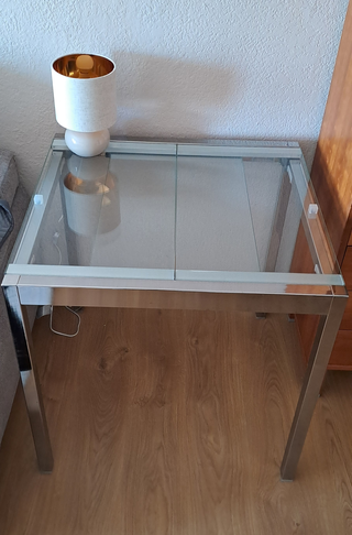 Mesa extensible metal y cristal