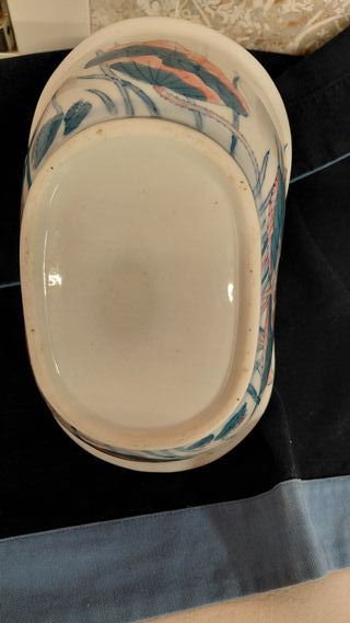 Centrotavola ceramica a forma cestino con manico