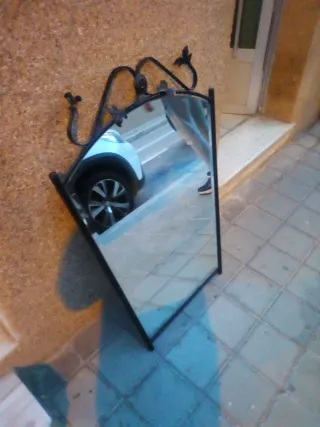 Espejo de hierro forjado curvo