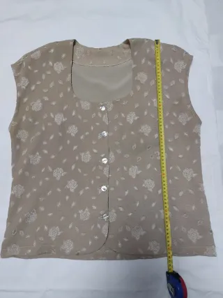 Camisa sin mangas beige mujer