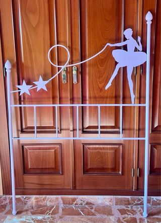 Cabecero forja niña con adorno bailarina estrellas