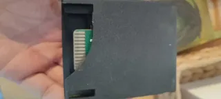 Atari 2600 con 2 cartuchos y accesorios