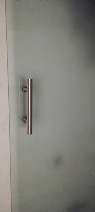 Puerta corredera de cristal