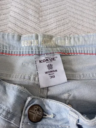 Shorts vaqueros étnicos desgastados