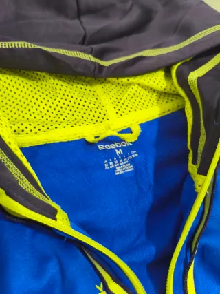 Reebok Sudadera Cremallera Azul Neón Mujer